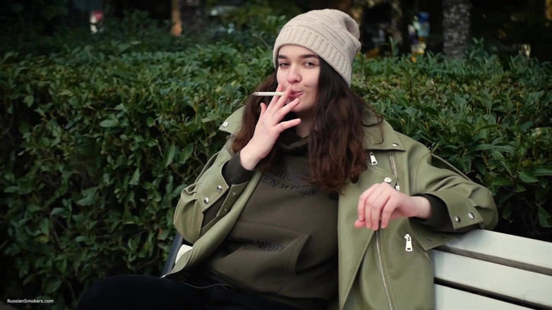 Russian Smokers: Young Brunette Is Taking an Unhurried Stroll with Allwhite 120mm Cigarette