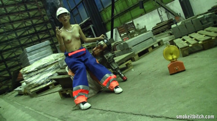 Smoke it bitch: Skinny blonde worker in the factory takes her break for...