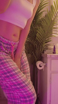 Emily pissing in the bathroom