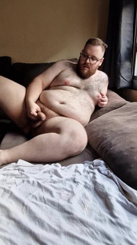 Fat Hairy Jerks off While Watching Porn