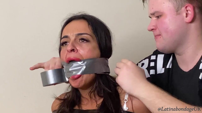 Latina Fetish: Latina Taped up Tight and Gagged with a Big Ballgag...
