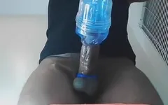 Masked Man in Tank Top Humping Fleshlight Until He Produces Moaning Cumshot