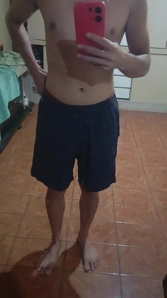 Ray Oliver: Boy in Shorts in the Mirror