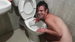 Human Toilet Slut Pisses on Her Own Face While Head in Toilet Lick Pee up