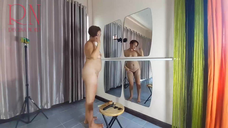 Regina Noir: Naked nudist hairdresser. She cuts her own hair. Regina Noir...