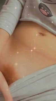 Gently masturbates her red pussy with her finger and gets an orgasm. Caressing excited tits