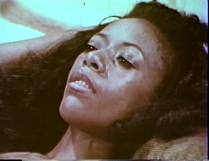 Vintage megastore: Curly haired guy fucks a skinny ebony chick.