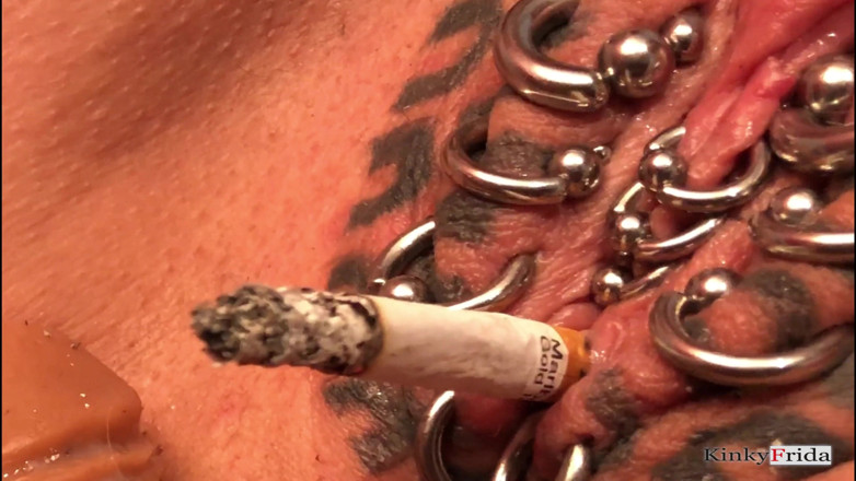 Dominatrix Frida: KinkyFrida in jeans is playing with her pierced and tattooed...