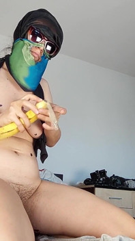 The Sexy Brunette Sucks the Banana