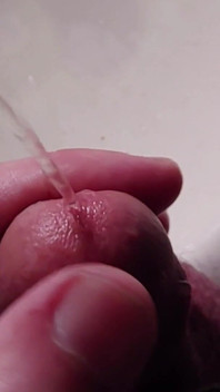 Peehole Piss Play Close up View in Slow Motion