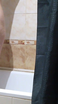 A Neighbor with Big Tits and a Big Ass Takes a Bath and Shaves Her Pussy