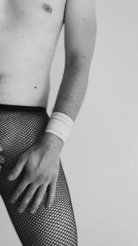 Sexy teen boy dances with only fishnets tease