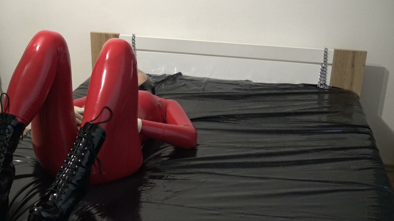 Latex Danielle: Photoshooting in Red Latex Catsuit with Latex Mask and Transparent...