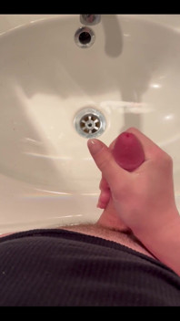 Masturbating