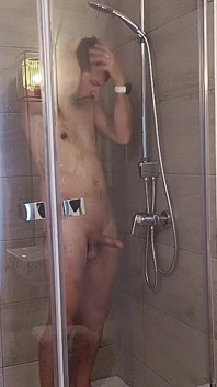 After a Full Day on the Road Wet Solo in the Hotel Shower