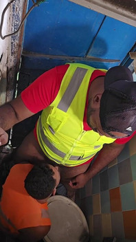 Construction Site Bathroom and Workers