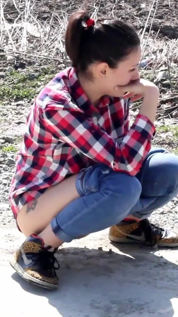 Desperate Girl with Full Bladder Has to Pee on a Dirt Road