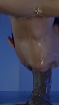 Sucking a Huge Black Cock in a Glory Hole