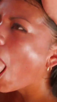 Brunette with big tits loves threesome sex in the cave by the sea