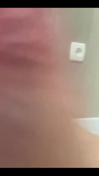 Masturbating