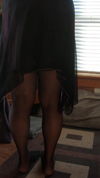 T-girl in Cute Minidress Dances Takes off Pantyhose and Teases