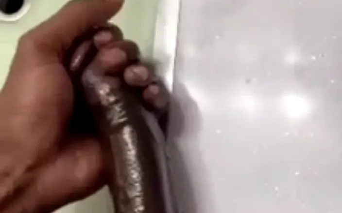 Big black cock BBCee: Bathroom solo stroking cumming hard