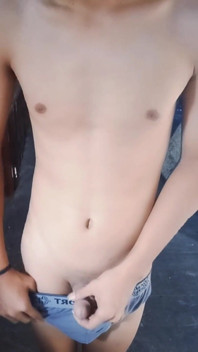 Asian Boy Masturbating in Warehouse