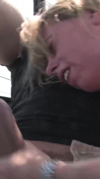 German couple has oral session outdoors