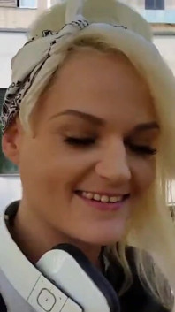 Alexa Gold in Front of a Hospital