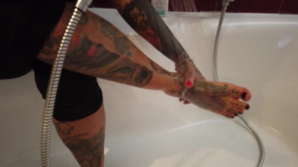 Fetish videos by Alex: Tattooed Blonde MILF Washes Her Feet