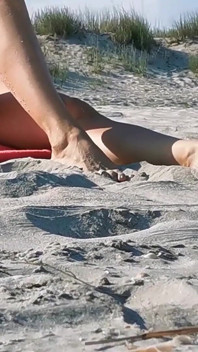 Hot MILF Masturbating on the Nudist Beach Got Caught on Camera