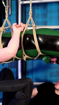 The Chastity Slave Is Bound in Ropes and Tormented with Feet