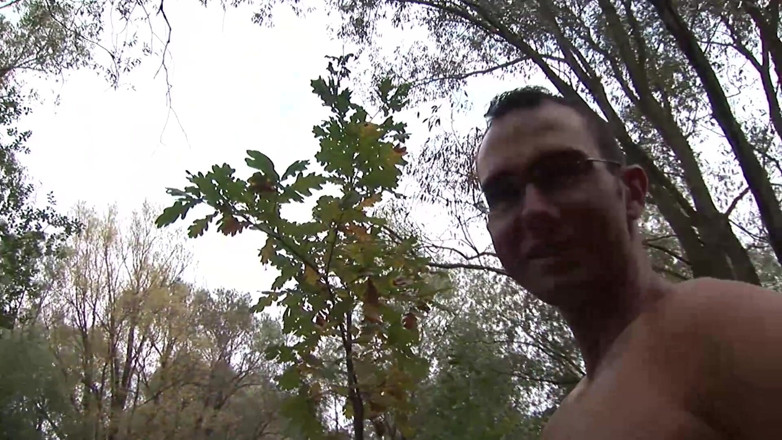 Backdoor Films: Spex babe is pleasing lucky guy's cock outdoors