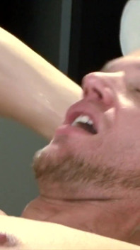 Steven Daigle pounds Nathan Price on the couch