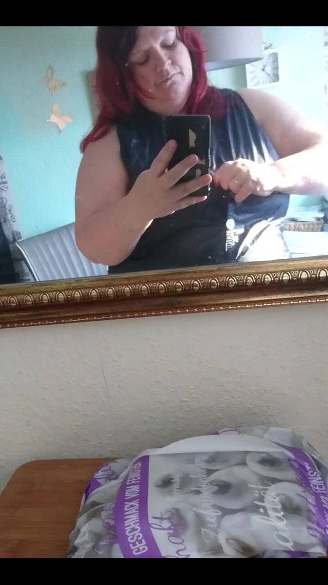 Showing off in a cool lab coat in front of the mirror (Tammarabig)