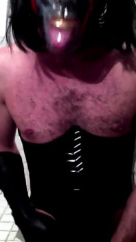 Latex Masked Sissy in Corset Cums in the Bathroom