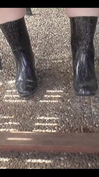 With Rubber Boots Outdoors