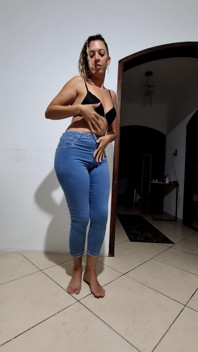Dancing and Slowly Taking off Her Clothes - Striptease