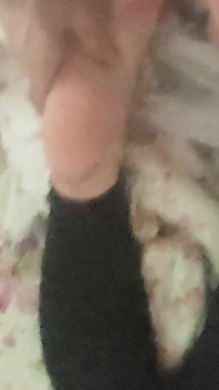 Playing with Friends Soles, While She's Reading.