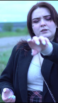 A Beauty with a Tattoo Shows Her Tits