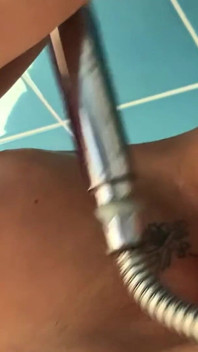 Neighbor wife showering and shaving her holes