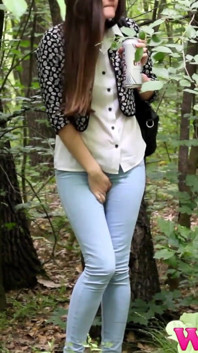 Desperate Brunette in a Forest Holding Her Crotch to Stop Herself From Pissing in Her Jeans