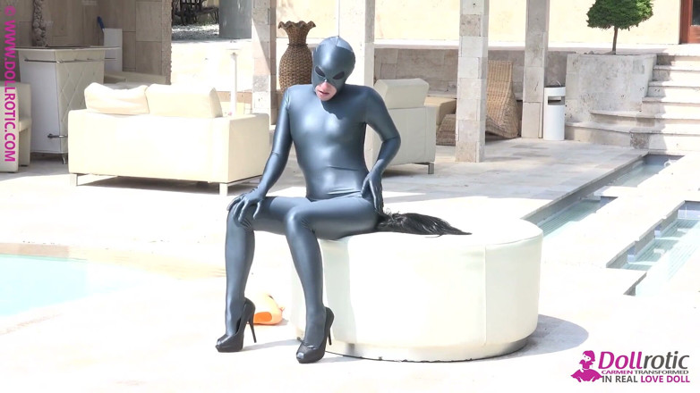 Dollrotic: Naked Rubber Doll Relaxing by the Pool