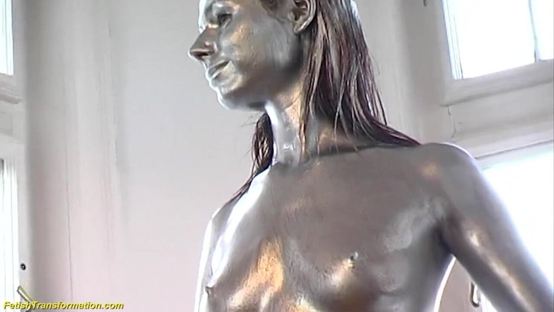 Fetish Islands: Silver metallic painted bald head statue mannequins posing