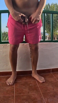Peeing on the Balcony on Holiday