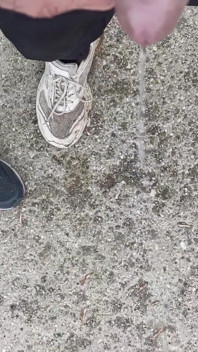 Friend Is Holding My Cock While Im Peeing on the Ground Outdoor