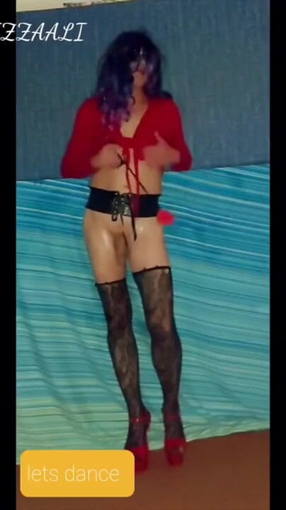 Lizzaali: Dancing in my corsett belt and red top