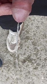 Friend Is Holding My Cock While Im Peeing on the Ground Outdoor