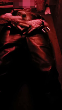 Cruising the Darkroom in Leather Pants