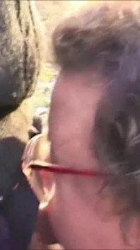 Old BBW chick sucks his cock outdoor in close up